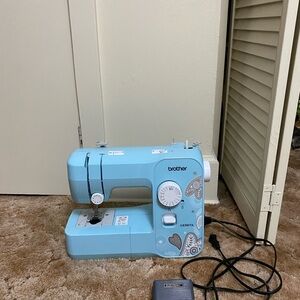 Brother Light Blue Sewing Machine with Patterned Design